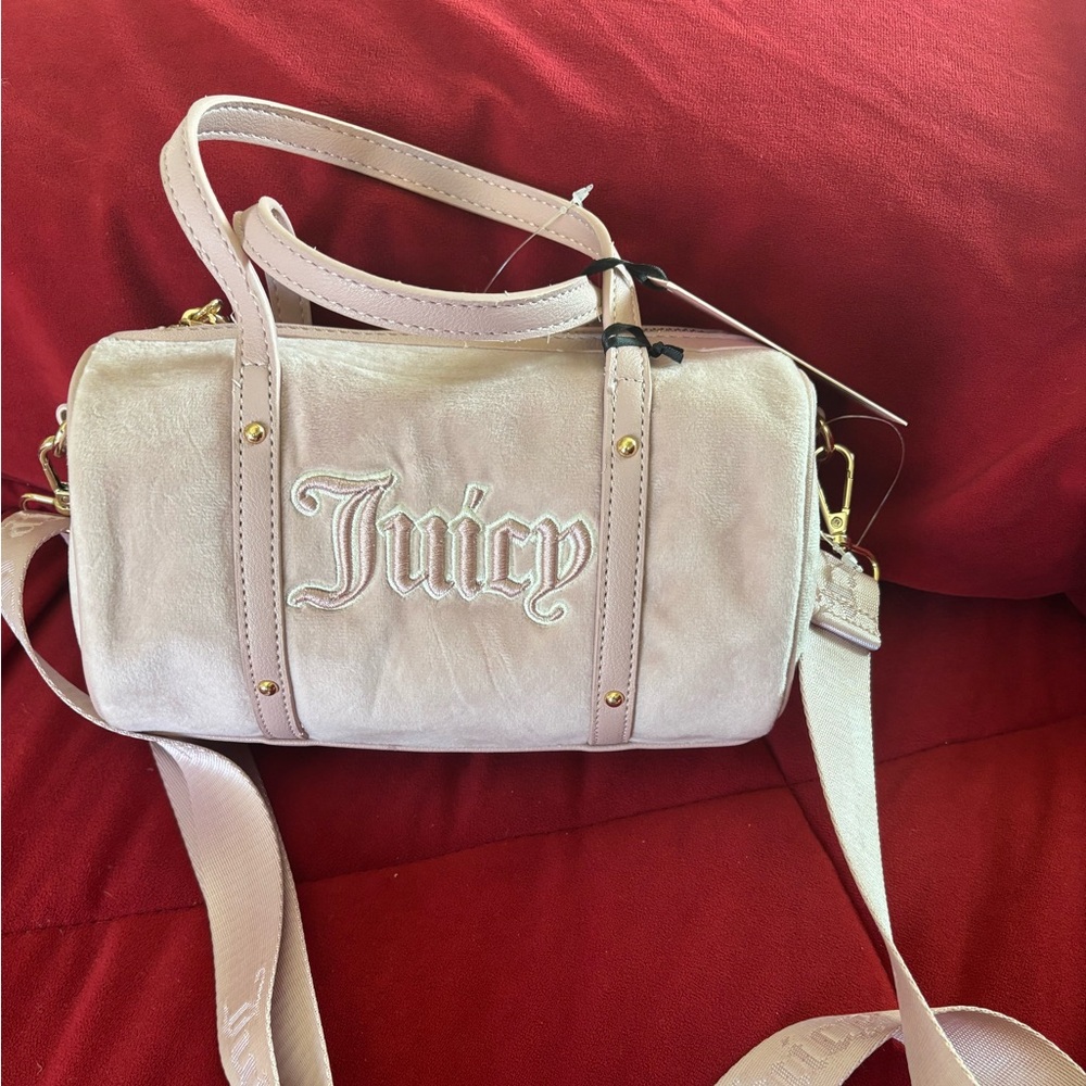 Light pink Juicy Couture barrel bag